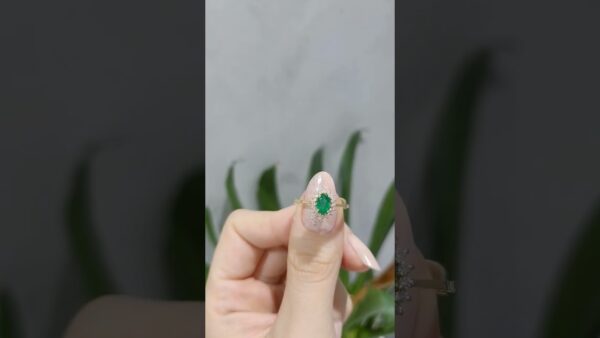 0.67 Ct Diamond and Emerald Ring product video