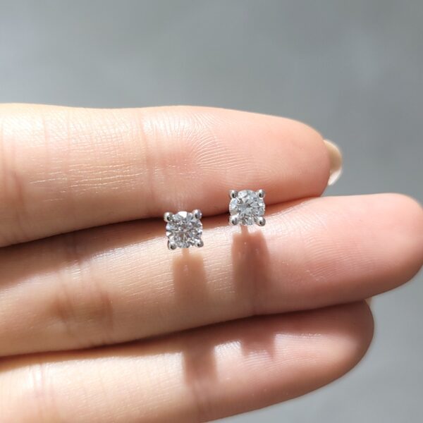 0.60 Ct GIA-Certified E-Colour Solitaire Diamond Earrings — image 1